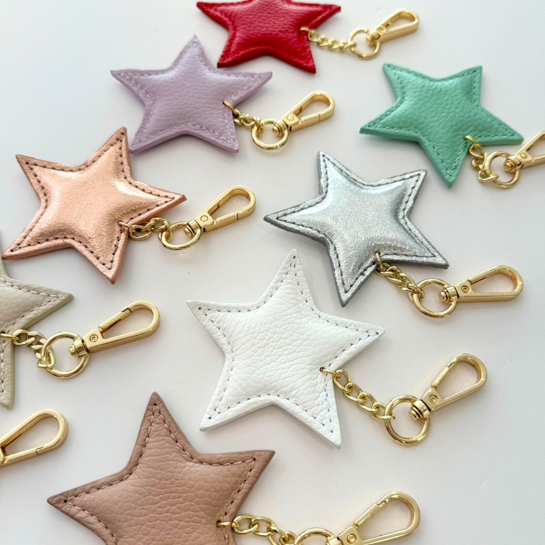 1 LLAVERO ESTRELLA PIEL