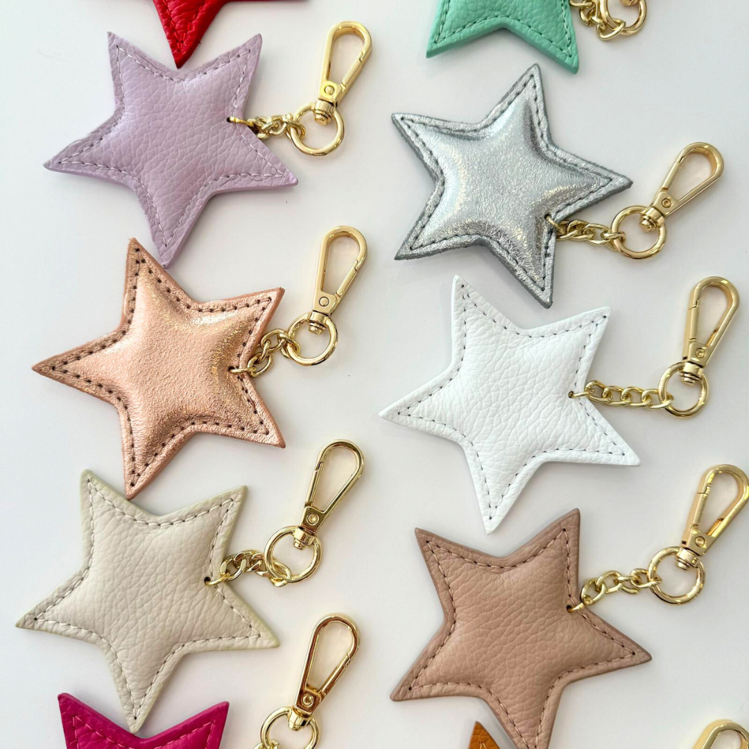 1 LLAVERO ESTRELLA PIEL