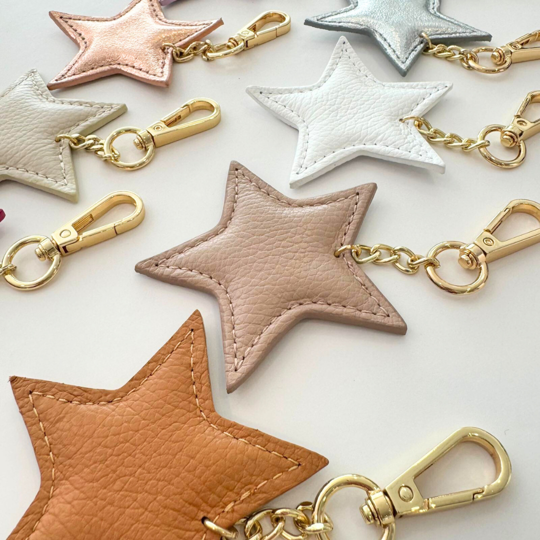 1 LLAVERO ESTRELLA PIEL