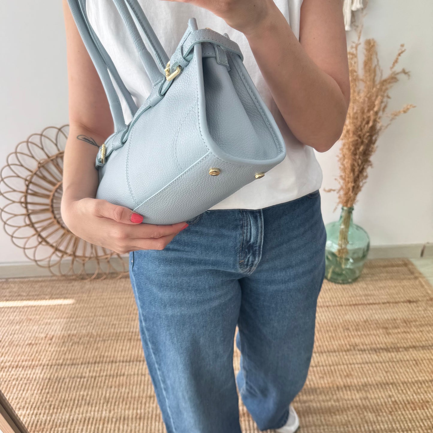 Bolso piel cierre cinturón celeste