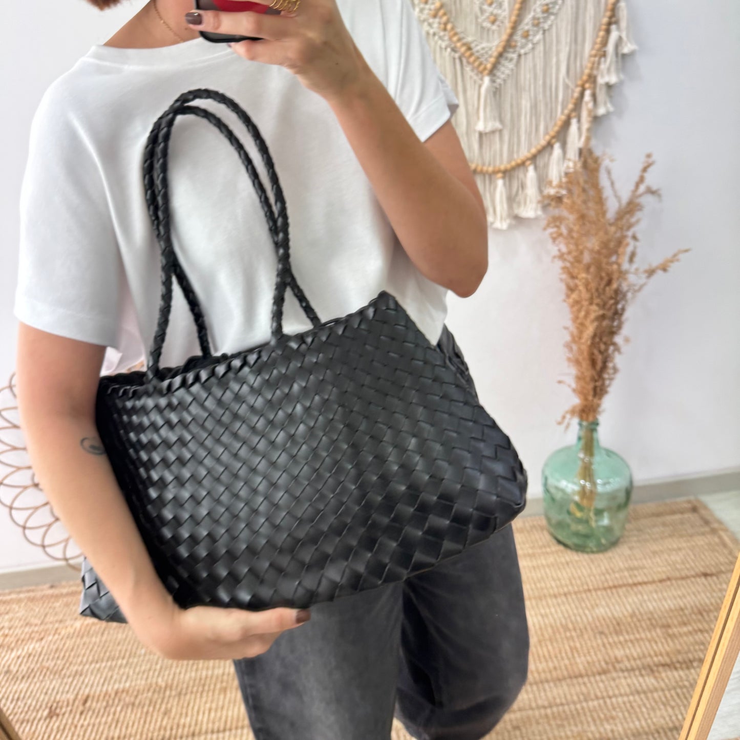 Bolso de piel trenzada trapecio negro