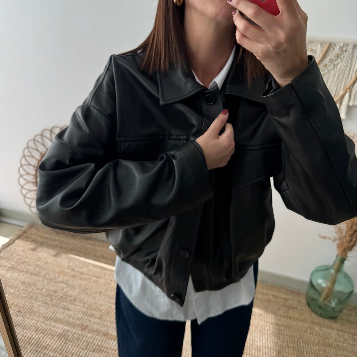 Cazadora negra 100% piel detalle pliegues