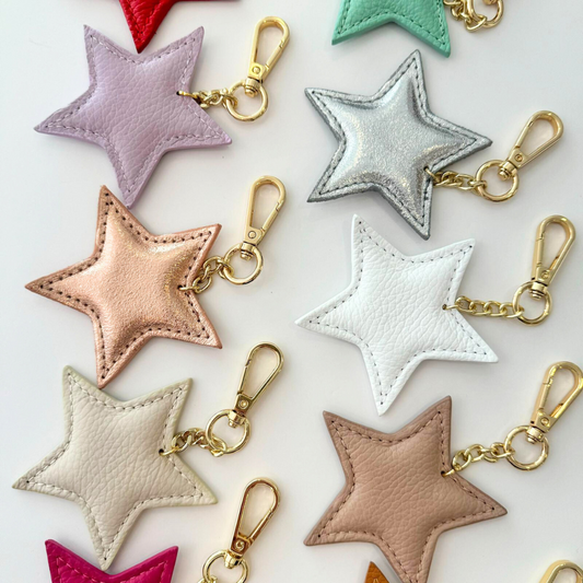 1 LLAVERO ESTRELLA PIEL