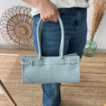 Bolso piel cierre cinturón celeste