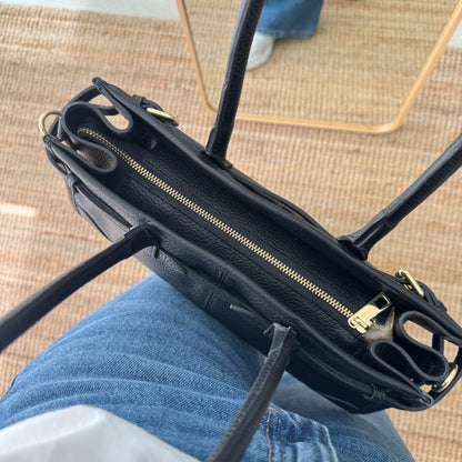 Bolso piel cierre cinturón negro