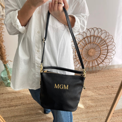 Bolso cremalleras piel negro iniciales bordadas