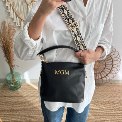 Bolso cremalleras piel negro iniciales bordadas