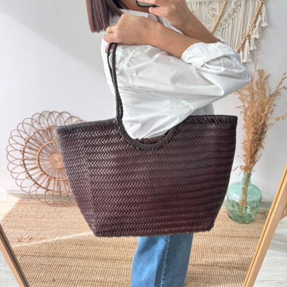 Capazo de piel trenzada marrón