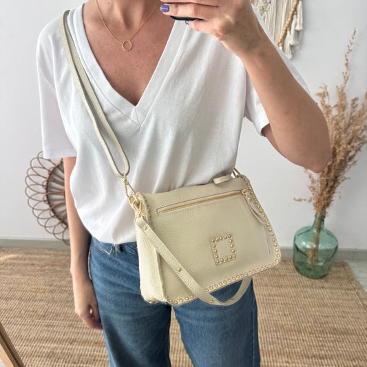 Bolso beige piel tachuelas doradas