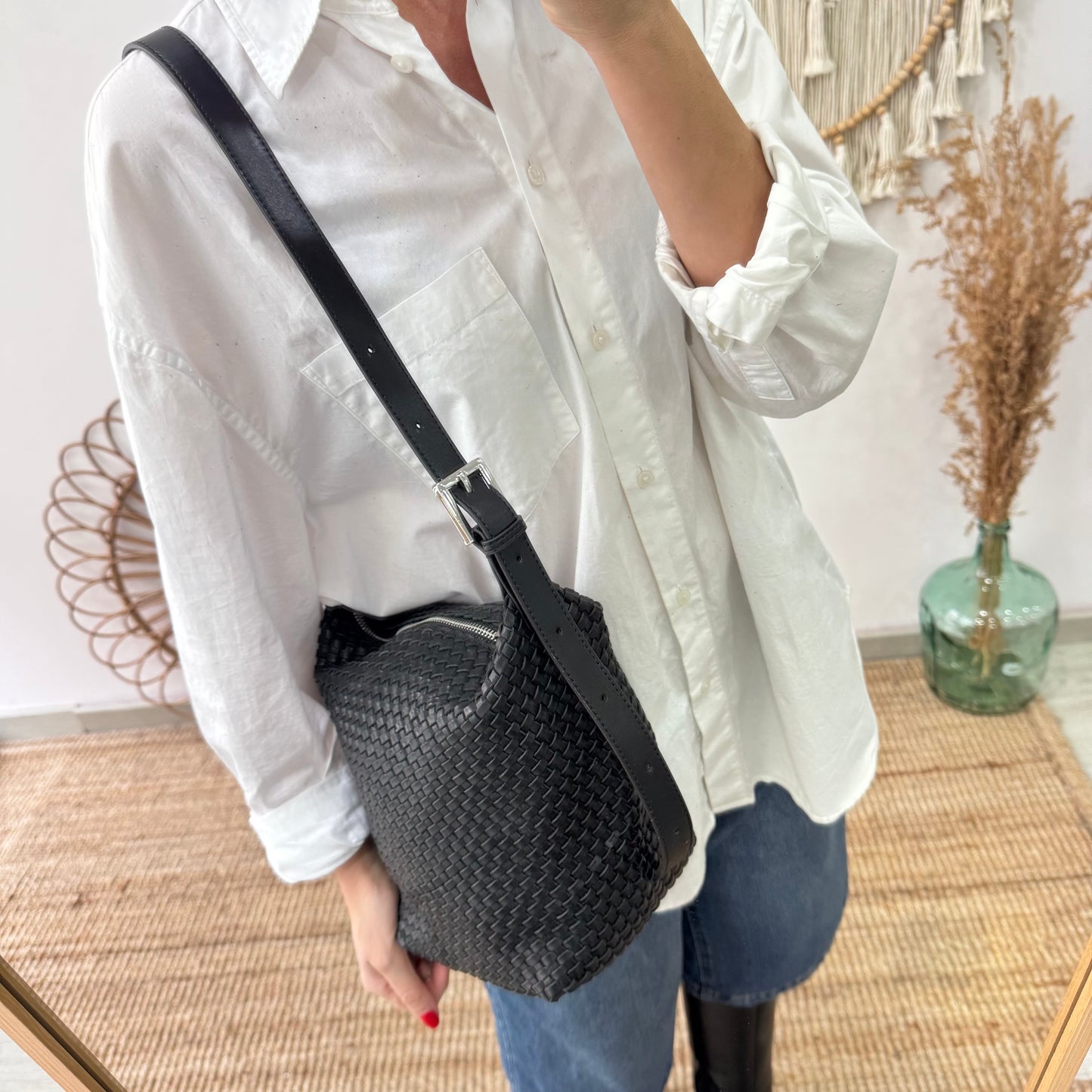 Bolso saco en piel trenzada cremallera negro