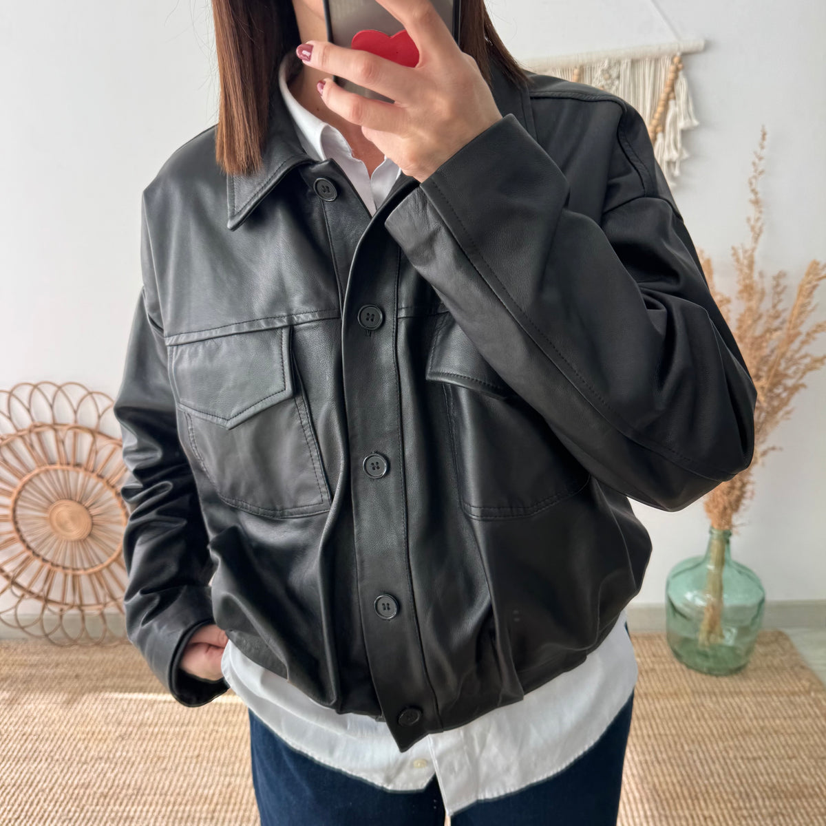 Cazadora negra 100% piel detalle pliegues