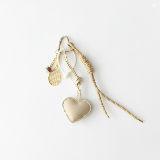 Charm raqueta y corazón blanco