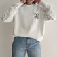 SUDADERA CUELLO REDONDO BLANCO INICIAL BORDADA