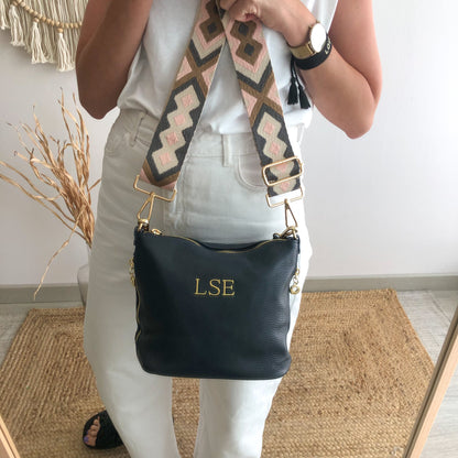 Bolso cremalleras piel azul marino iniciales bordadas