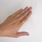 ANILLO ACERO LISO CON BOLITAS DORADO